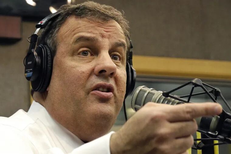 New Jersey Gov. Chris Christie sits in a studio during his radio program, “Ask the Governor,” on NJ 101.5 in 2014. Sunday he said he was no longer interested in being a talk radio host for WFAN after his governorship was over.