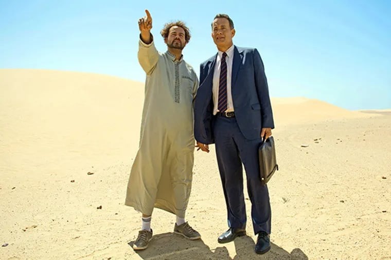 Tom Hanks is a beleaguered businessman on a sales trip to Saudi Arabia, with Sarita Choudhury, in "A Hologram for the King."