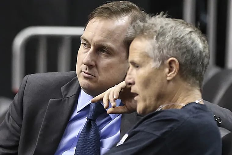 Sixers general manager Sam Hinkie (left) and head coach Brett Brown. (Steven M. Falk/Staff Photographer)