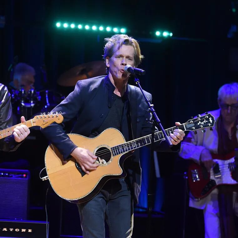 Kevin Bacon (on the right) with his brother Michael of the Bacon Brothers performing in New York in 2018. Kevin Bacon has posted a cover of Beyonce's single "Texas Hold 'Em" on Instagram. (Jamie McCarthy/Getty Images for God's Love We Deliver/TNS)