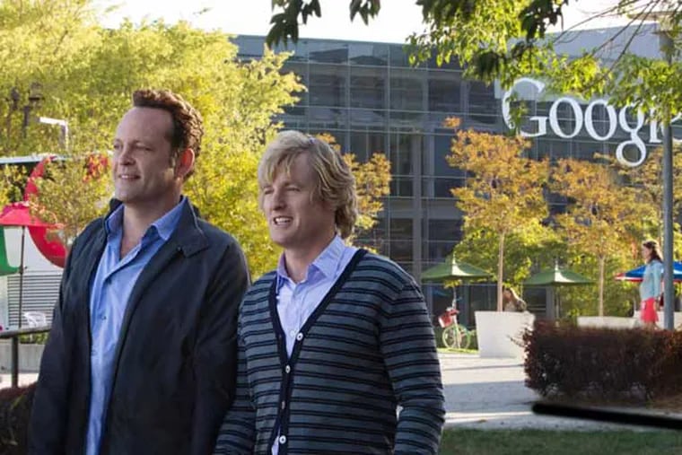 This film publicity image released by 20th Century Fox shows Owen Wilson, right, and Vince Vaughn in a scene from "The Internship." (AP Photo/20th Century Fox, Phil Bray)