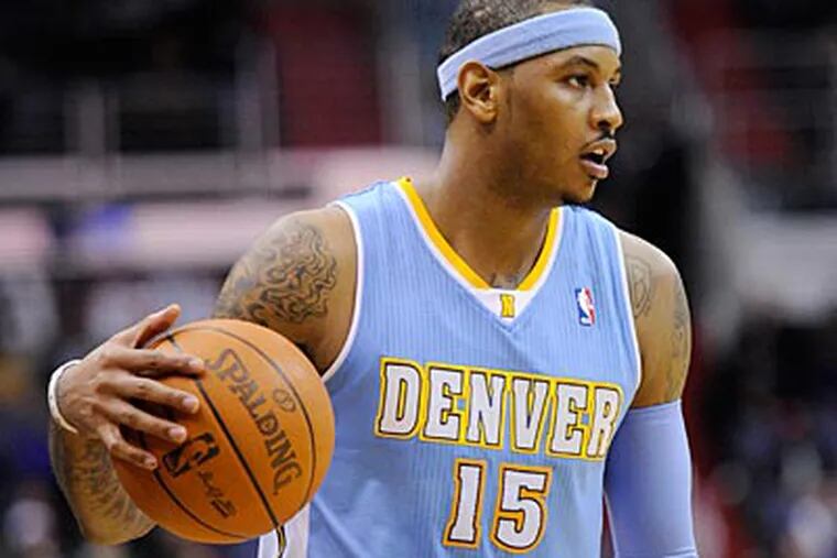 Carmelo Anthony has been surrounded by trade speculation for weeks. (Nick Wass/AP Photo)