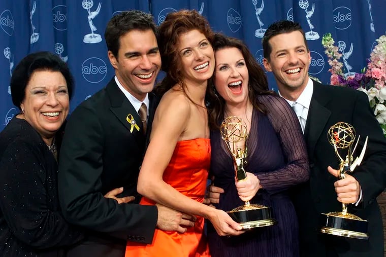 In this Sept. 10, 2000, file photo, Shelley Morrison, from left, Eric McCormack, Debra Messing, Megan Mullally and Sean Hayes celebrate their awards for their work in "Will & Grace" at the 52nd annual Primetime Emmy Awards in Los Angeles. Morrison, an actress with a 50-year career who was best known for playing a memorable maid on “Will and Grace,” has died.