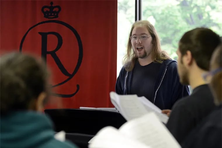 Samuel Gorelick rehearses as co-director with the Madrigals Ensemble at Rutgers-Camden May 6, 2013, where he will graduate next year, one of seven area high school seniors profiled four years ago as they embarked on their college search process. (TOM GRALISH/ Staff Photographer)