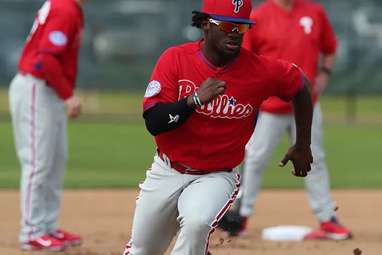 Odubel Herrera runs to third at a full squad practice at Bright House
Field in Clearwater, Fla. (David Swanson/Staff Photographer)