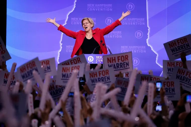 Democratic presidential candidate Sen. Elizabeth Warren (D., Mass.) acknowledges the applause as she arrives on stage to speak at the New Hampshire state Democratic Party Convention, Saturday, Sept. 7, 2019 in Manchester, NH.
