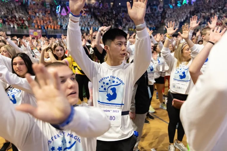 Michael Wang performs the Line Dance during the Penn State IFC/Panhellenic Dance Marathon, THON 2023 at the Bryce Jordan Center in University Park, Friday.