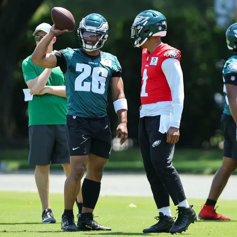 Saquon Barkley and Jalen Hurts shown during Eagles OTAs on Wednesday.