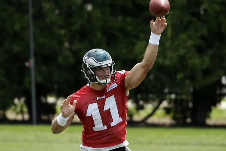 Tim Tebow throws the football during an Eagles workout. (Associated Press)