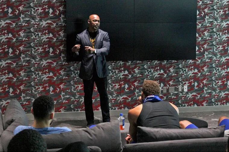 Former Eagles great Brian Dawkins speaks to the Sixers on Tuesday.