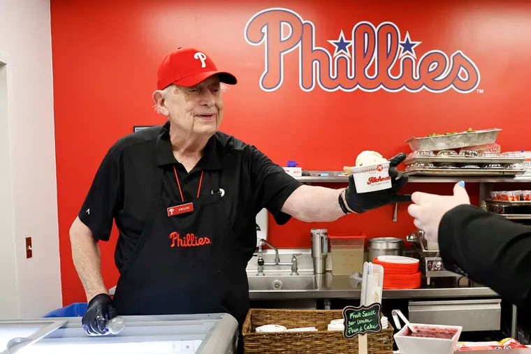 Frank Mazzuca, 82, aka “Frankie Two Scoops” serves ice cream in the Citizens Bank Park press box dining room on Saturday.