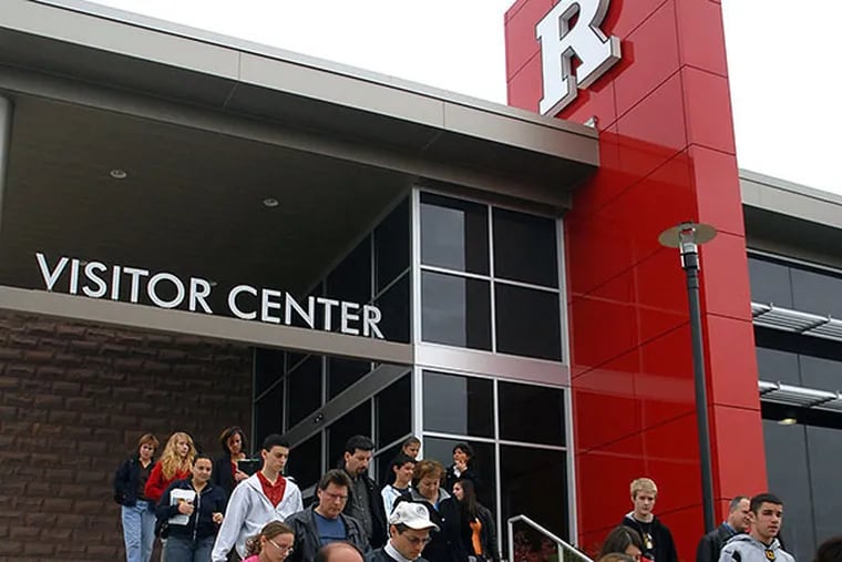 Prospective students and their parents leave Rutgers University's Visitors Center.