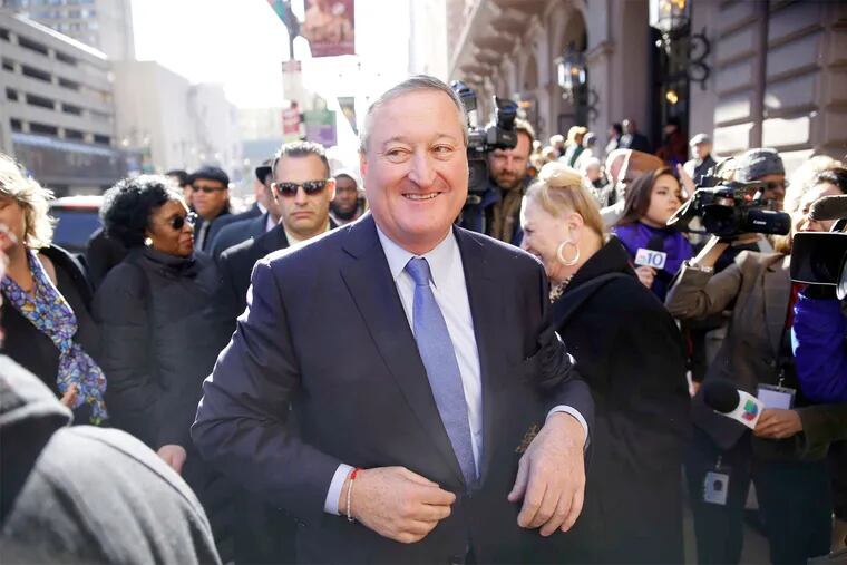 Mayor Kenney starts his walk up Broad Street to City Hall from the Academy of Music ceremony.