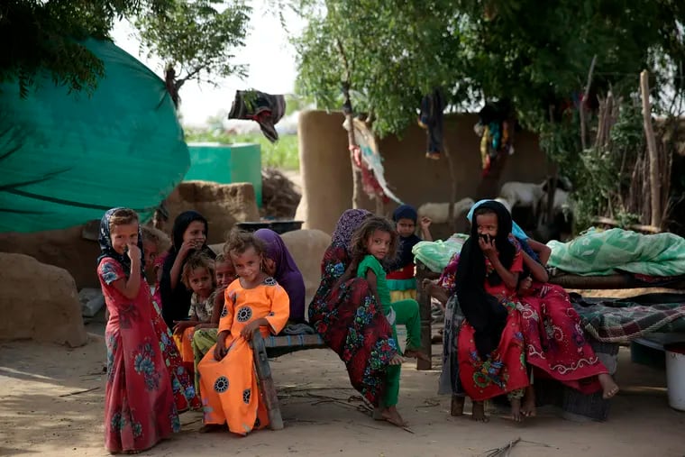 FILE - In this Oct. 7, 2016 file photo, girls gather at a camp for internally displaced people near the town of Abs, in the Hajjah governorate, of Yemen. The U.N. Office for the Coordination of Humanitarian Affairs, or OCHAU.N. warned in a report Tuesday, March 12, 2019, that thousands of Yemeni civilians caught in fierce clashes between warring factions are trapped in the embattled northern district of Hajjah. The number of displaced in the district has doubled over the past six months, the humanitarian agency said. (AP Photos Hani Mohammed, File)