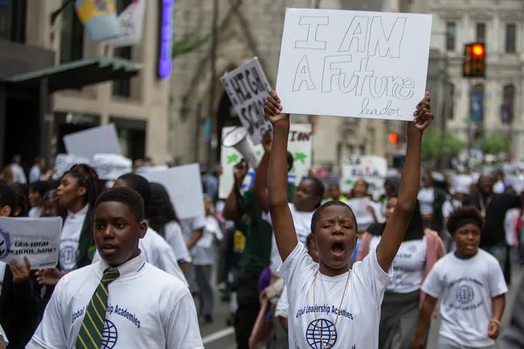 Students and supporters of Global Leadership Academy Charter School march down Broad Street from City Hall to deliver a message to the Board of Education on Thursday, May 23, 2019. Some Philadelphia charter school leaders are accusing the Philadelphia School District of targeting black-led charter schools for closure.