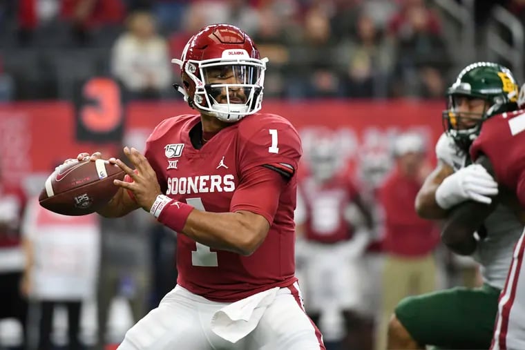 Eagles second-round pick Jalen Hurts getting ready to unleash a throw against Baylor in the Big 12 championship game last December. Hurts ran and threw for 52 touchdowns in 2019.
