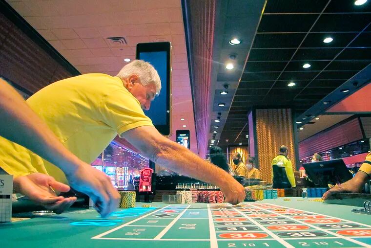 Gamblers placing a bet on a roulette table at Bally's casino in Atlantic City, N.J. A bill granting tax relief to Atlantic City's nine casinos is in the hands of New Jersey Gov. Phil Murphy on Dec. 21, 2021 following its passage by the state Legislature.