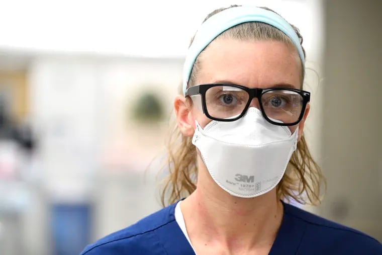 Kelly Williams is a nurse in the Emergency Department of the Johns Hopkins Hospital and must wear an N95 mask as part of her daily routine during the pandemic.