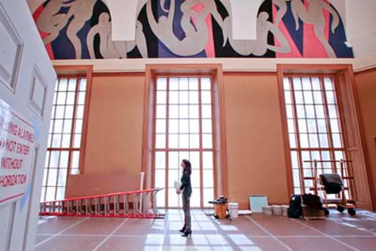 Nancy S. Leeman, senior registrar, examines "The Dance," a three-panel mural by Henri Matisse now at The Barnes Philadelphia. The panels were moved from The Barnes Merion. Leeman is in charge of moving the collection to Philadelphia. MICHAEL S. WIRTZ / Staff Photographer