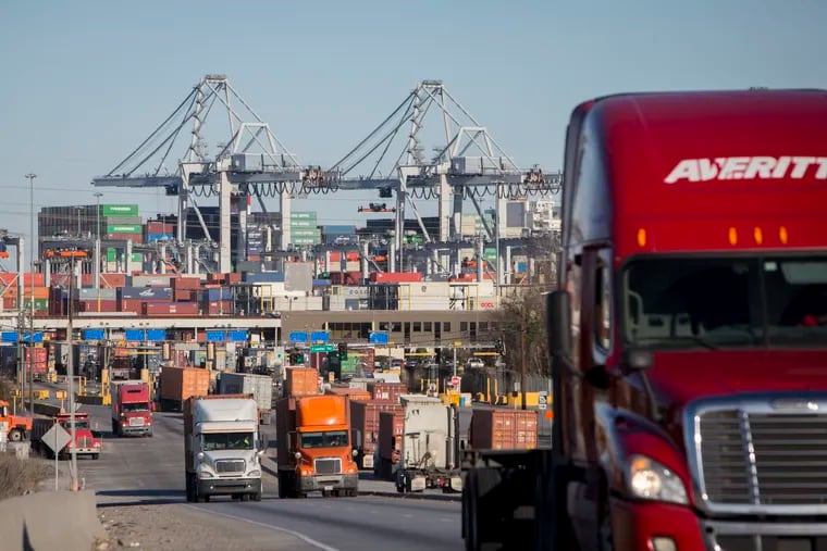Tractor-trailers move cargo out of the Port of Savannah in Savannah, Ga. Job growth has been strong, but wage growth has been below expectations. 