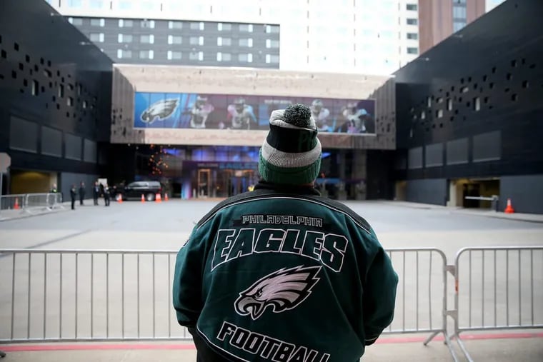 Philadelphia Eagles fan Frank Rodriguez, of St. Paul, MN, waits for the team to arrive outside its  hotel in Bloomington, MN on January 28 2018.