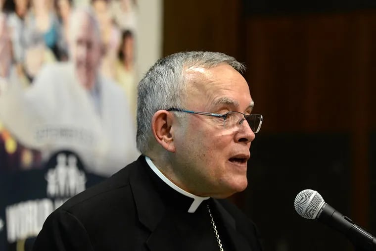 Archbishop Charles Chaput speaks at a panel discussion on the challenges immigrant families face. (TOM GRALISH/STAFF PHOTOGRAPHER)