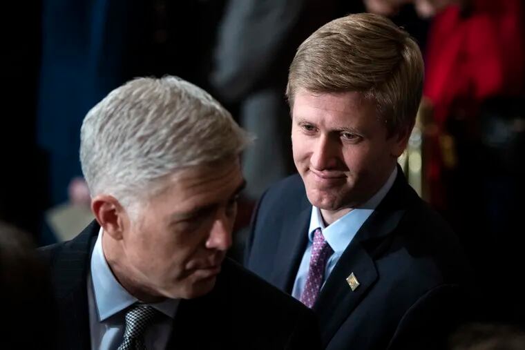 In a Monday, Dec. 3, 2018 file photo, Nick Ayers, right, listens as Supreme Court Associate Justice Neil Gorsuch waits for the arrival of the casket for former President George H.W. Bush to lie in State at the Capitol on Capitol Hill in Washington. President Donald Trump's top pick to replace John Kelly as chief of staff, Nick Ayers, is no longer expected to fill that role, according to a White House official. The official says that Trump and Ayers could not agree on Ayers' length of service. (Jabin Botsford/The Washington Post via AP, Pool, File)