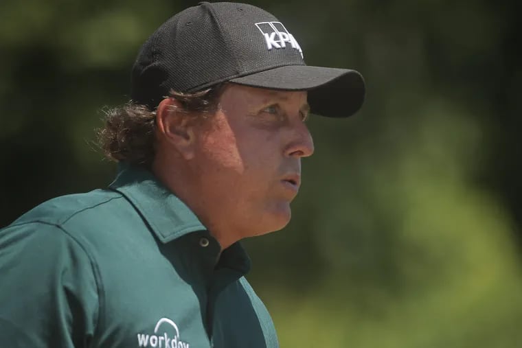Phil Mickelson came under fire for hitting a moving ball on Saturday.