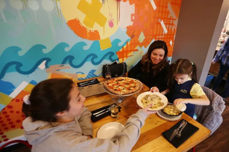 Angie Reneges dined at Biga in Bryn Mawr recently with daughters Nia, 13, and Elina, 5. The angled corner space is three storefronts combined.
