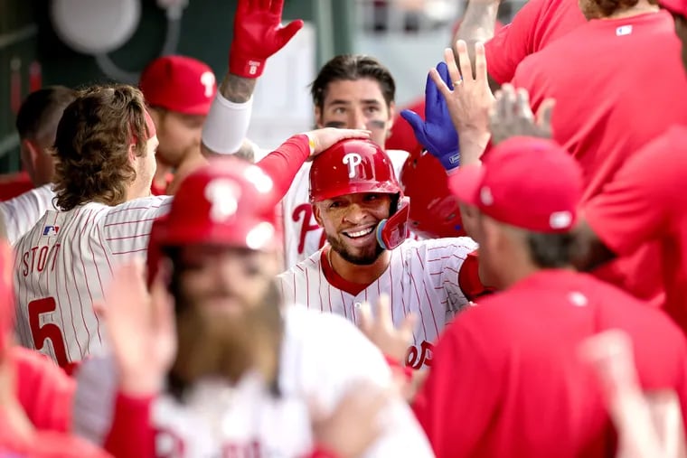 Edmundo Sosa of the Phillies celebrates after his 3-run home run against the Rangers in the 4th inning.