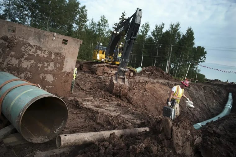 Workers in Minnesota in August replacing sections of a pipeline that stretches along the northern part of the state.