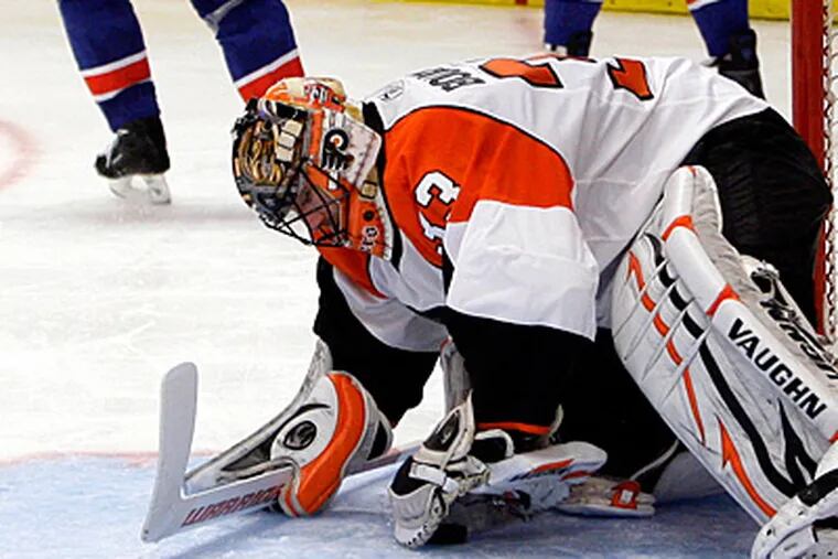 Flyers goalie Brian Boucher reacts to his team's 4-3 loss to the Rangers. (AP Photo/Frank Franklin II)