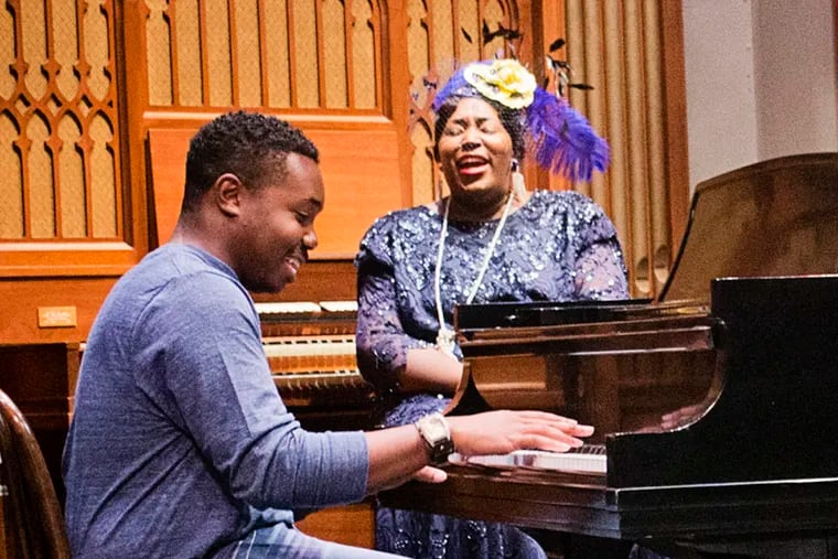 Donnel Treadwell at the piano and Dionne Grooms-Fields rehearse their parts for Rutger University's production of 'Hand Me Down the Silver Trumpet'. The play opens October 16 in the Walter K. Gordon Theater. Rutger University. Camden, NJ. October 9, 2014. Daily News Staff / Randi Fair