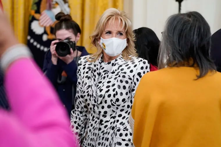 First lady Jill Biden wearing a mask with a sunflower in support of the Ukrainian people at an event to celebrate Black History Month in the East Room of the White House on Monday.