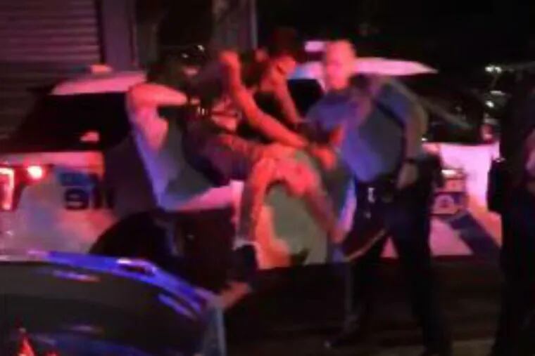 A still shot from the video of a Monday arrest that is under investigation by Philadelphia Police Department's Internal Affairs Unit.