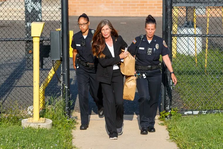 Former Pennsylvania Attorney General Kathleen Kane walks out of the Montgomery County jail in 2019 after serving eight months for a perjury conviction.  She served about another months there in the spring for violating probation by her 2022 DUI arrest.