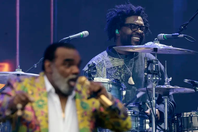 Questlove keeps the beat for Ronald Isley and the Isley Brothers during the Roots Picnic in 2023.