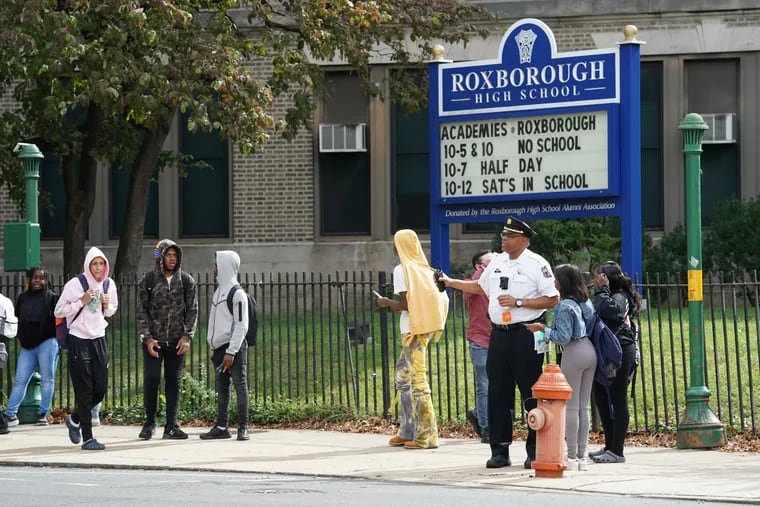 Roxborough High School at the end of the school day on Wednesday, the day after five students were shot — one fatally — following a football scrimmage.