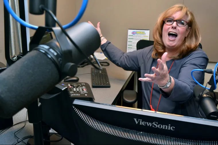 Radio personality Marilyn Russell shows her joy and exuberance as she edits an interview at the WOGL studio in Bala Cynwyd Pa..