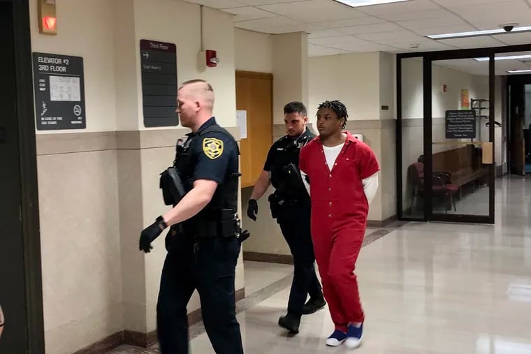 Keshaun Sheffield is escorted from a courtroom in the Montgomery County Courthouse. Sheffield pleaded guilty to third-degree murder in the death of his boyfriend, Rashid Young.