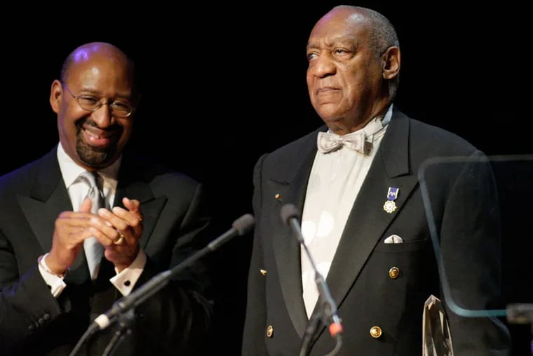 Bill Cosby stands at attention immediately after Phila. Mayor Michael Nutter handed Cosby the Marian Anderson Award at the Kimmel Center on April 6, 2010.