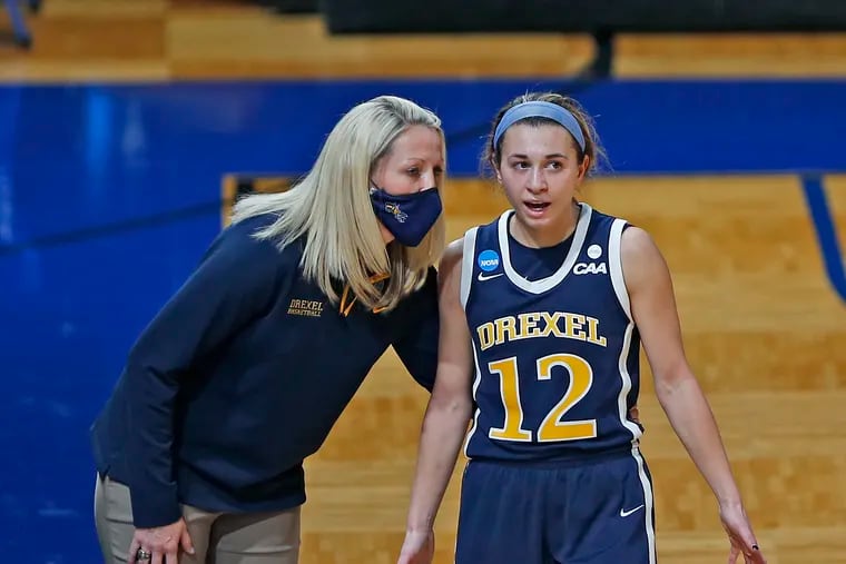 Drexel coach Amy Mallon talks with Dragons guard Hannah Nihill during Monday's NCAA game.