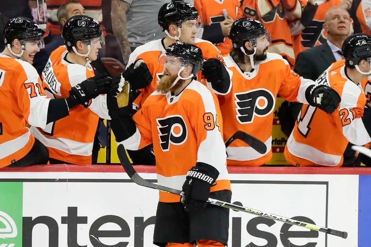Flyers defenseman Ryan Ellis celebrates his goal with this teammates against the Seattle Kraken on Oct. 18. He has been injured most of the season and has played just four games.