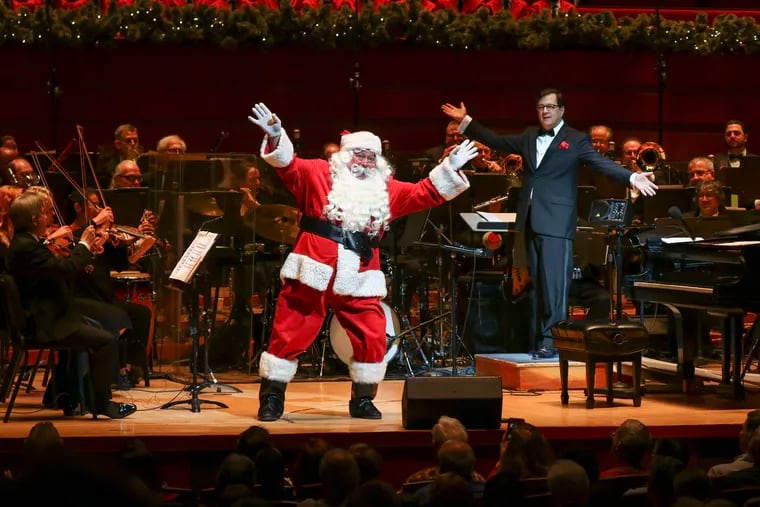 Santa with Philly Pops conductor Todd Ellison at the opening show of the Philly Pops Christmas Spectacular Saturday afternoon in Verizon Hall. Photo: Bachrach.Photo