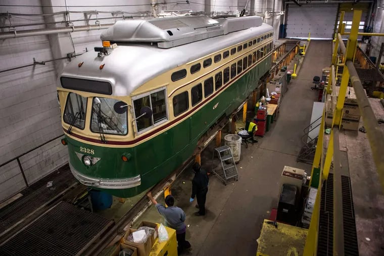 A trolley car undergoes maintenance at SEPTA's repair facility on Callowhill Street in West Philadelphia. Most American cities shifted from trolleys to buses decades ago, but Philadelphia has a century-old tunnel that lets several trolley lines bypass Center City traffic gridlock.