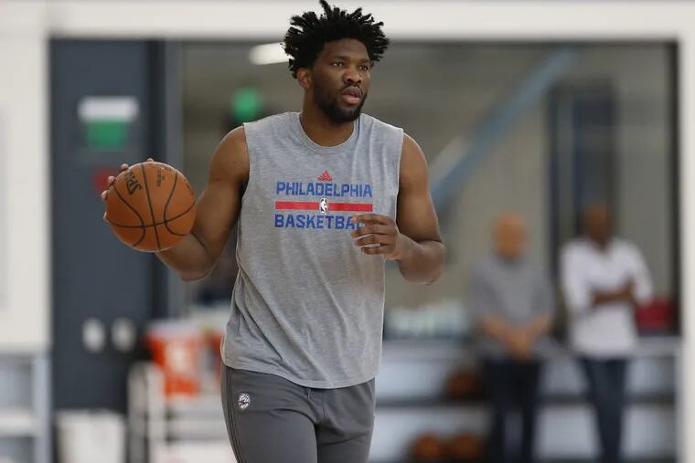 Joel Embiid dribbles during minicamp at the Sixers training complex in Camden, NJ on June 30, 2017. The center was fined $10,000 by the NBA Saturday for the use of inappropriate language on social media.