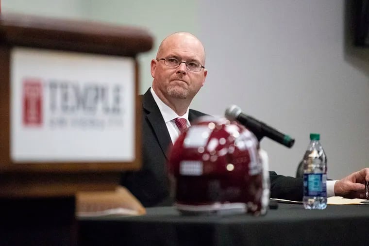 Rod Carey listens while Temple Athletic Director Patrick Kraft speaks during a press conference announcing Carey as the new head coach of Temple Football at the Liacouras Center in Philadelphia on Friday, Jan. 11, 2019. Carey was formerly the head coach at Northern Illinois University.