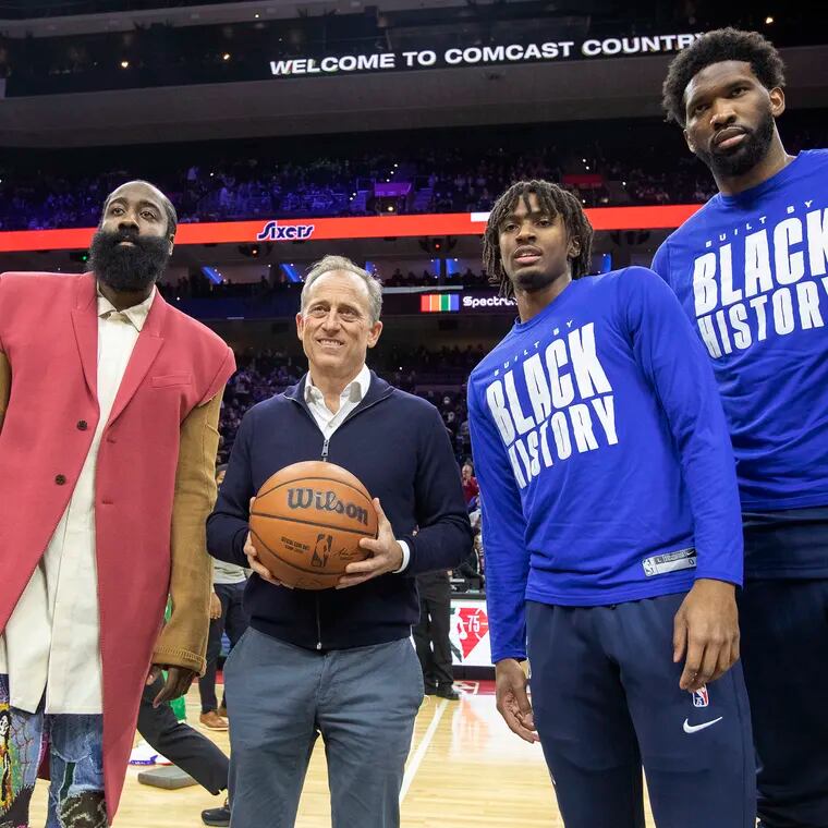 Josh Harris with his Sixers stars, James Harden, Tyrese Maxey, and Joel Embiid.