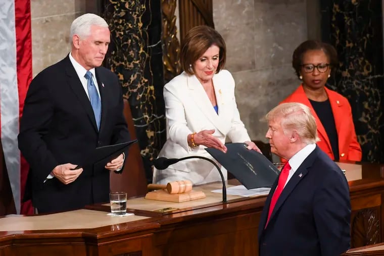 House Speaker Nancy Pelosi (center), President Trump (right) and vice president Mike Pence (left) during Trump's State of the Union address in February.