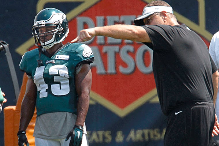 Eagles running back #43 Darren Sproles gets some instruction on running the offensive drill on Thursday during Eagles training camp.